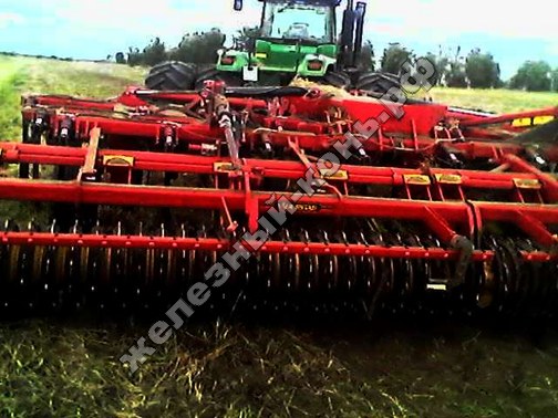 Трактор John Deere 9630 cо стерневым культиватором Vaderstad Top Down 700 фото