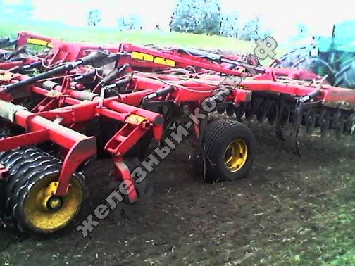 Трактор John Deere 9630 cо стерневым культиватором Vaderstad Top Down 700 фото
