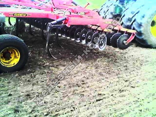 Трактор John Deere 9630 cо стерневым культиватором Vaderstad Top Down 700 фото
