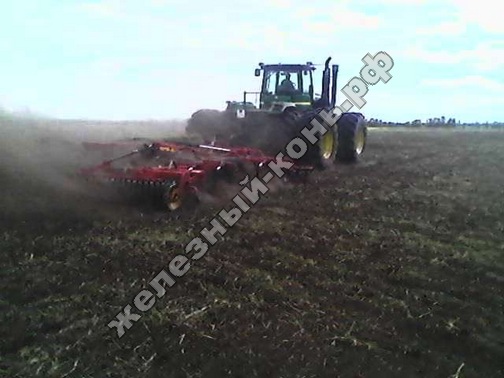 Трактор John Deere 9630 cо стерневым культиватором Vaderstad Top Down 700 фото